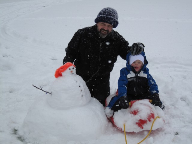 The day after Christmas I built a snowman with Daddy and Grampa!