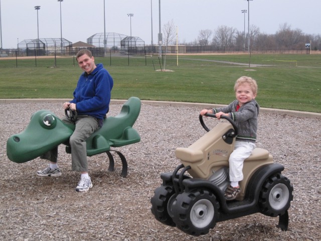I rode a tractor at the park while Daddy road an Alligator!